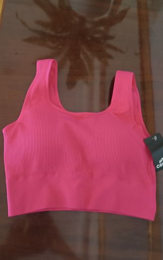 Top deportivo Crivit rosa fucsia con etiqueta