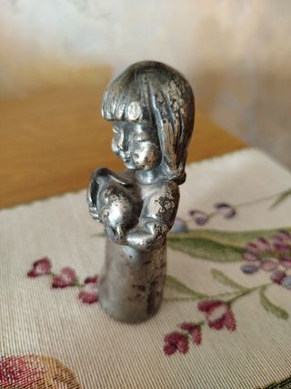 Fermacarte vintage in peltro