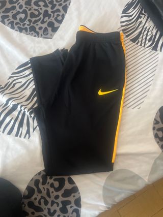 Tuta ragazzo Nike nera e gialla