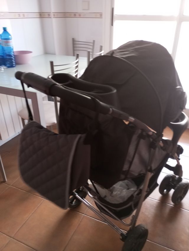 Silla de paseo plegable con una mano.Impecable