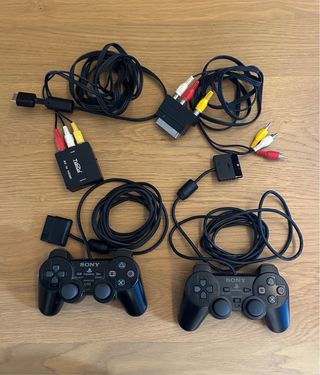 Play Station 2 + 8 Juegos + 2 mandos + buzz...