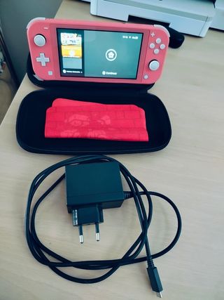 Nintendo Switch Lite Coral + Funda