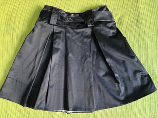 Falda negra con bolsillos y lazo estilo elegante M