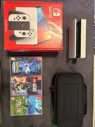 Nintendo Switch OLED bianco + giochi + custodia