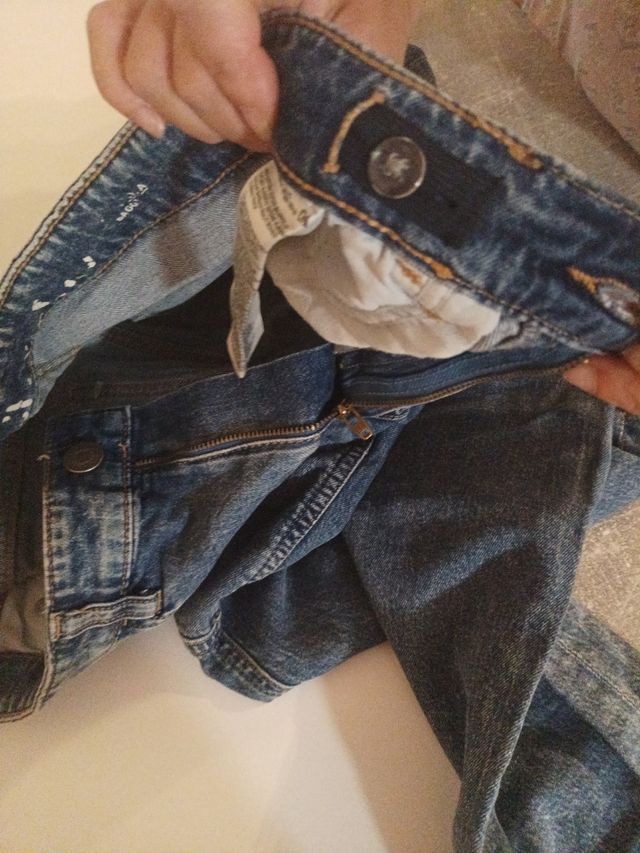 Pantalones vaqueros desgastados