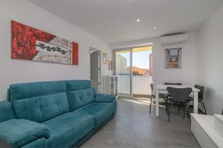 Muebles salón comedor y sofá azul