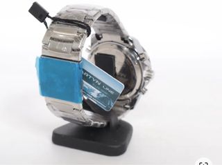 Reloj NA plateado