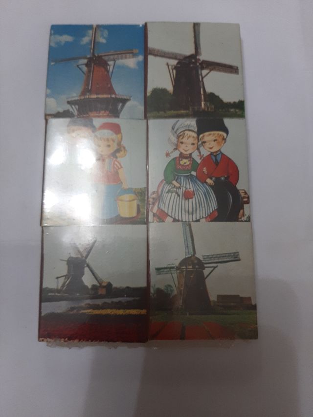 Cajas de cerillas antiguas con molinos y niños