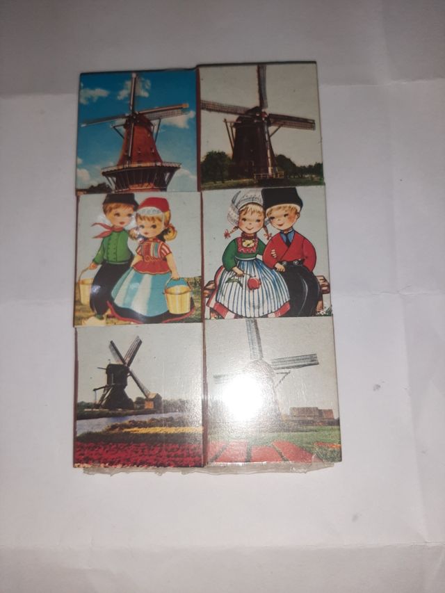 Cajas de cerillas antiguas con molinos y niños