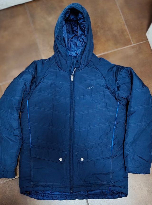 Reebok abrigo acolchado. Leer..