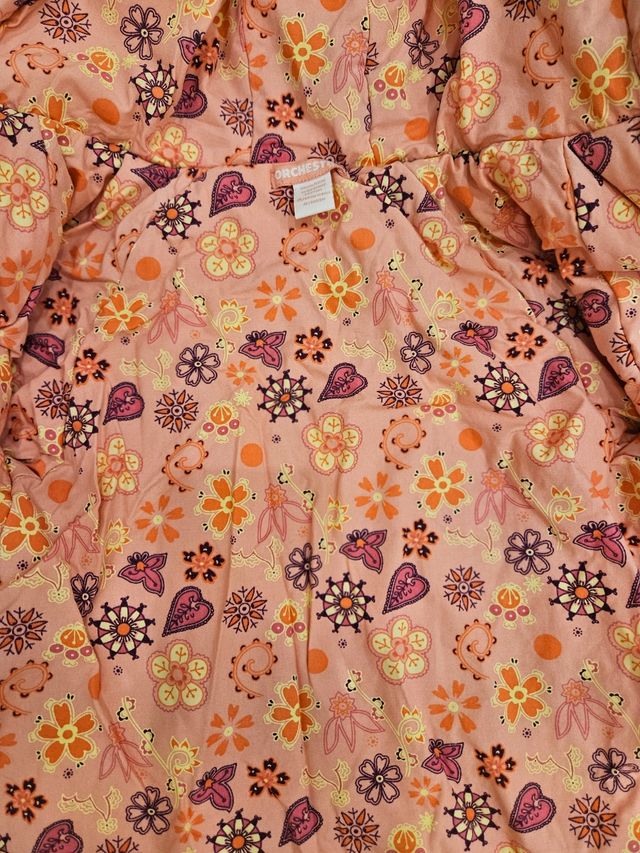 Chaquetas, vestidos y conjuntos en diversas tallas