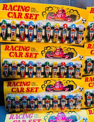 Blíster 10 coches de carreras hojalata japoneses