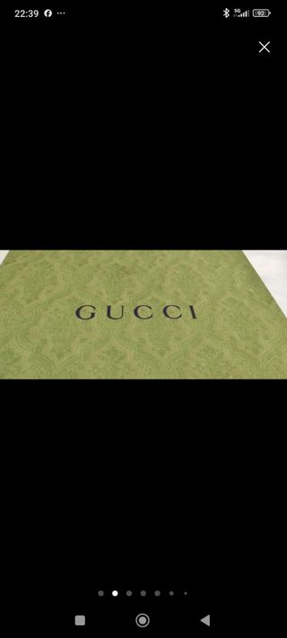 Caja y bolsa Gucci 