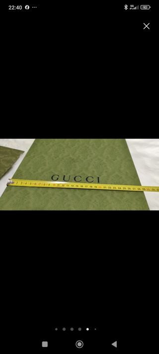 Caja y bolsa Gucci 