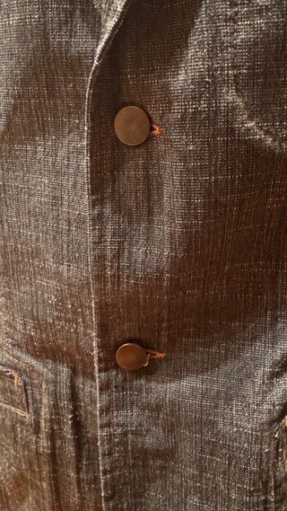 Comoda giacca grigio scuro con cuciture arancioni