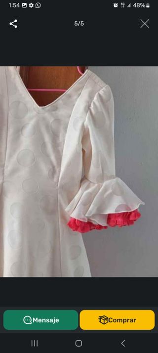 Traje de flamenca blanco con volantes rojos