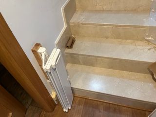 Barrera de seguridad para escaleras automatica