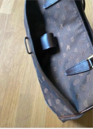 Borsa in tela marrone Etro con logo del marchio inciso. 