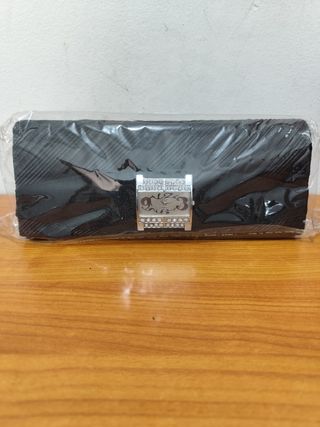 Pochette TSL nera con orologio