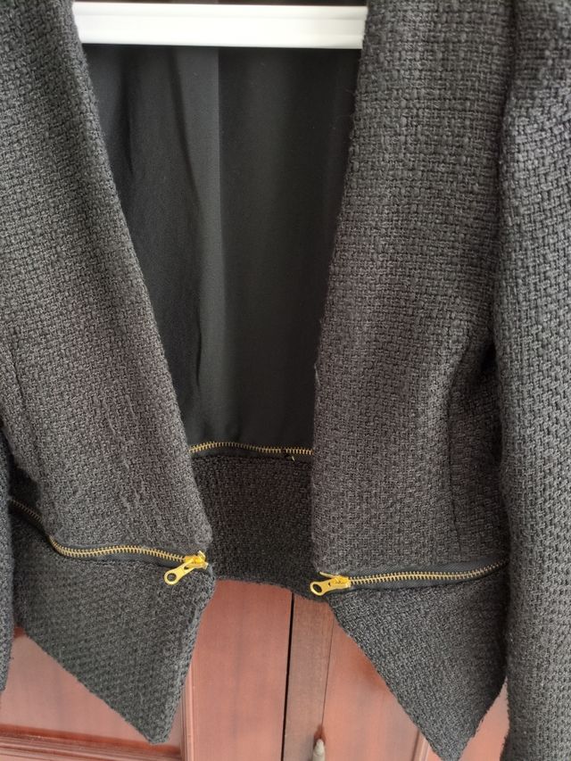 Giacca Chanel nera con cerniere dorate