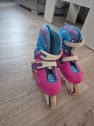 Patines Oxelo rosas y azules talla 32-35.

