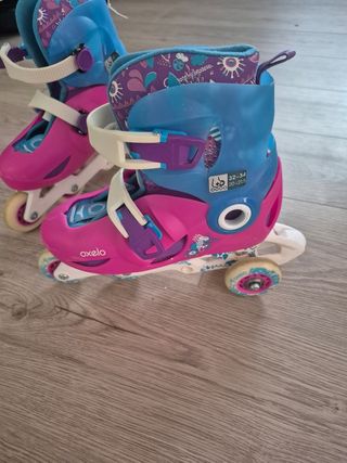 Patines Oxelo rosas y azules talla 32-35.

