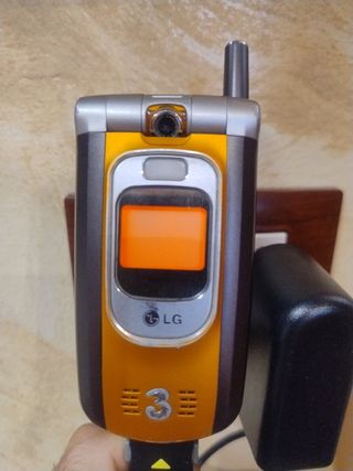LG H3G Cellulare con Caricabatteria da casa
