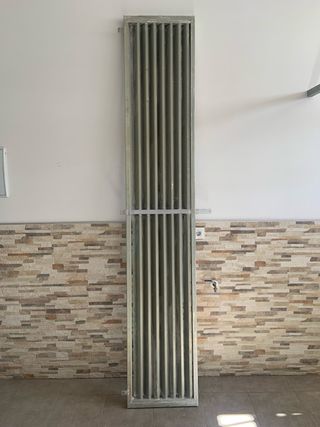 Rejilla ventilación puerta garaje