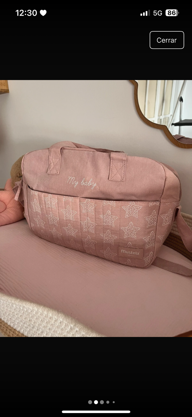 Bolso de maternidad rosa con estrellas