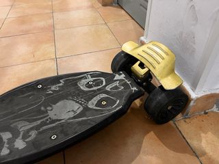Patinete con manillar negro