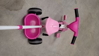 Triciclo infantil marca FEBER para bebé rosa