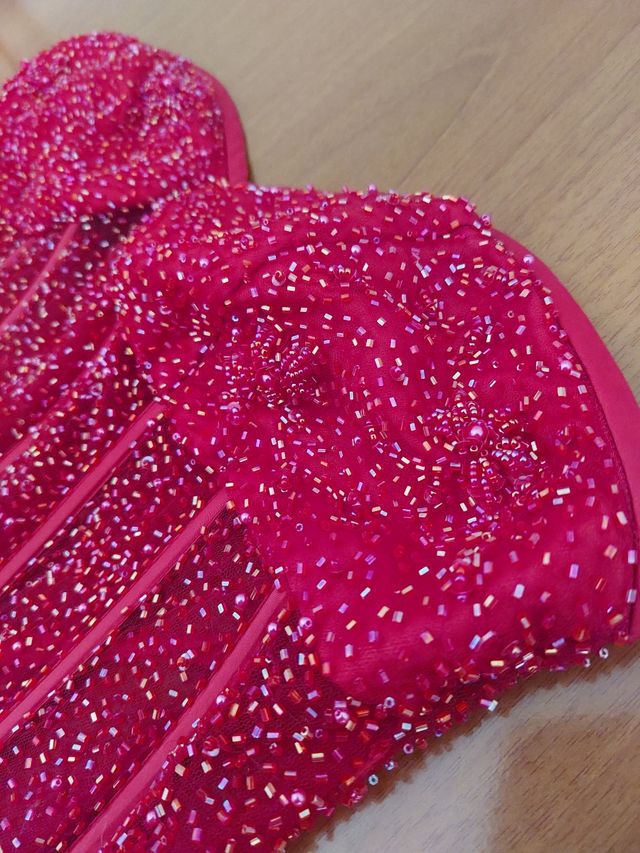 Corsetto rosso con perline