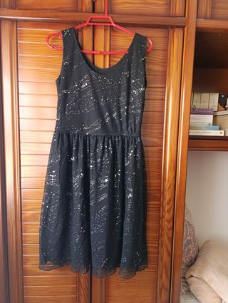 Vestido de fiesta y chaquetas 