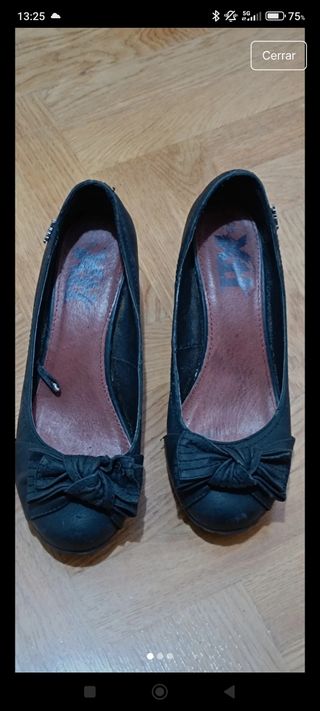 Zapatos negros con lazo