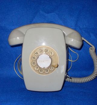 Teléfono Heraldo Pared Gris