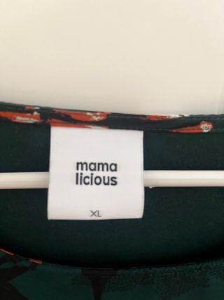 Vestido premamá verde botella con detalle floral