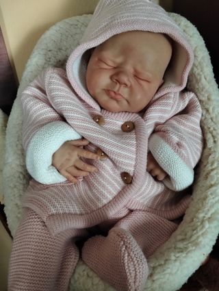 Muñeca Reborn realista con latidos