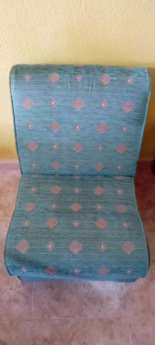 Sillón de tela verde y azul, sin brazos