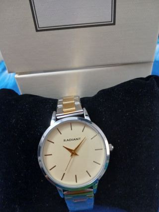 Reloj Radiant Oro y Plata