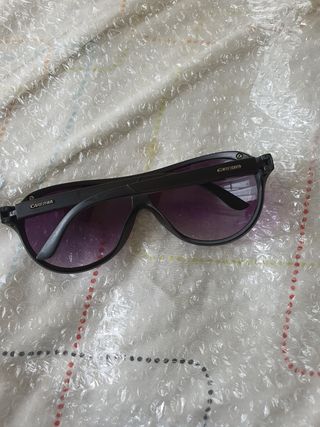 Gafas de sol Carrera negras y doradas