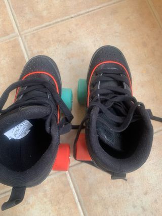 Patines de bota negros 4 ruedas.Oxelo talla 32