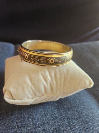 Bracciale rigido con decorazioni oro e nero