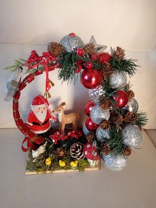 Centrotavola natalizio con Babbo Natale e cerbiatt