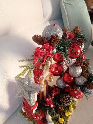 Centrotavola natalizio con Babbo Natale e cerbiatt