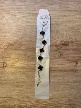 Pulsera Van Cleef & Arpels Negra y Dorada