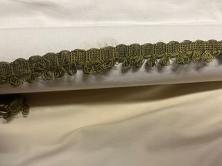 Passamaneria con nappe color verde oliva