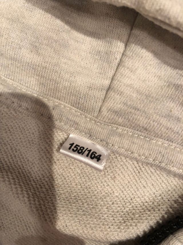 Sudadera gris Zeeman con capucha