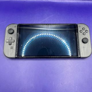 Nintendo Switch OLED + Custodia Joy-Con Gioco