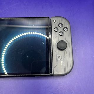 Nintendo Switch OLED + Custodia Joy-Con Gioco