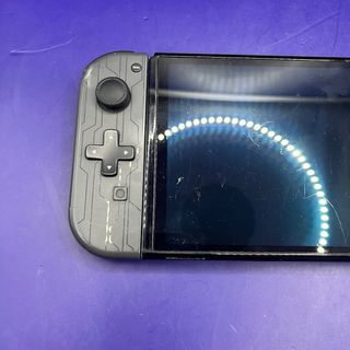 Nintendo Switch OLED + Custodia Joy-Con Gioco